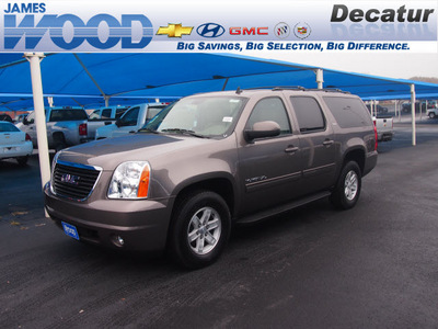 gmc yukon xl 2012 brown suv slt 1500 flex fuel 8 cylinders 2 wheel drive 6 speed automatic 76234