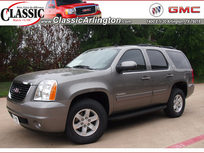 gmc yukon 2012 graystone metallic suv slt flex fuel 8 cylinders 2 wheel drive automatic 76018