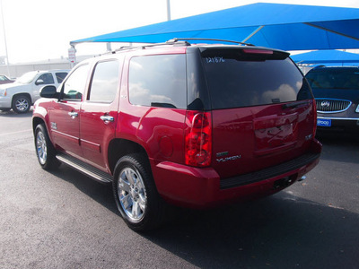 gmc yukon 2012 red suv slt flex fuel 8 cylinders 2 wheel drive 6 speed automatic 76234