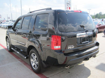 honda pilot 2011 black suv touring gasoline 6 cylinders 4 wheel drive automatic 77301