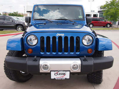 jeep wrangler unlimited 2009 blue suv sahara gasoline 6 cylinders 4 wheel drive automatic with overdrive 76018