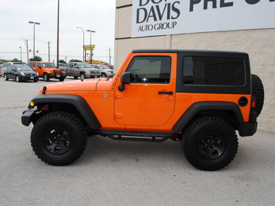 jeep wrangler 2012 orange suv sport gasoline 6 cylinders 4 wheel drive automatic 76011