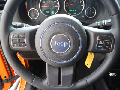 jeep wrangler 2012 orange suv sport gasoline 6 cylinders 4 wheel drive automatic 76011