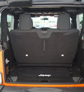 jeep wrangler 2012 orange suv sport gasoline 6 cylinders 4 wheel drive automatic 76011