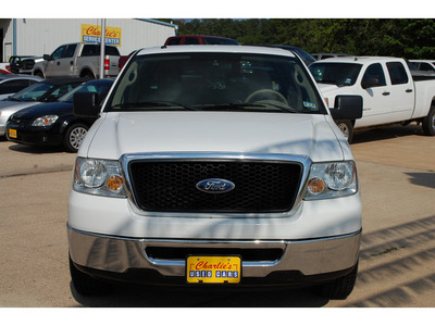 ford f 150 2007 white xlt gasoline 8 cylinders rear wheel drive automatic with overdrive 77340