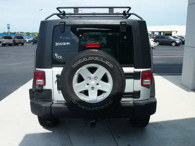 jeep wrangler 2009 silver suv x gasoline 6 cylinders 4 wheel drive automatic 76234