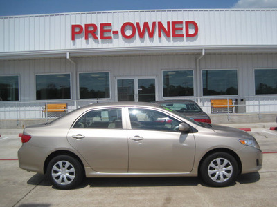 toyota corolla 2010 tan sedan le gasoline 4 cylinders front wheel drive automatic 77301