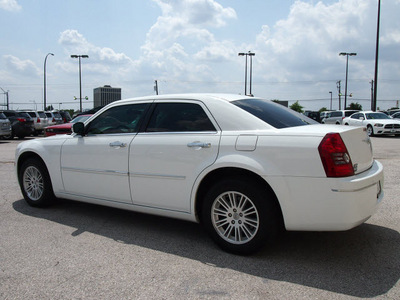 chrysler 300 2010 white sedan touring gasoline 6 cylinders rear wheel drive automatic 76011