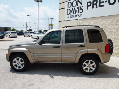 jeep liberty 2004 beige suv limited gasoline 6 cylinders rear wheel drive automatic with overdrive 76011