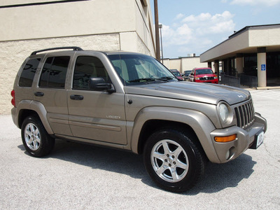 jeep liberty 2004 beige suv limited gasoline 6 cylinders rear wheel drive automatic with overdrive 76011