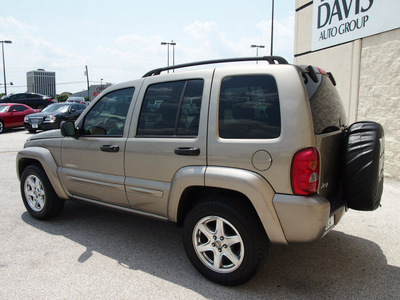 jeep liberty 2004 beige suv limited gasoline 6 cylinders rear wheel drive automatic with overdrive 76011