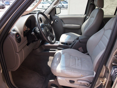 jeep liberty 2004 beige suv limited gasoline 6 cylinders rear wheel drive automatic with overdrive 76011