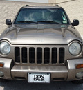 jeep liberty 2004 beige suv limited gasoline 6 cylinders rear wheel drive automatic with overdrive 76011