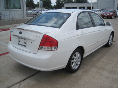 kia spectra 2007 white sedan lx gasoline 4 cylinders front wheel drive automatic 77301