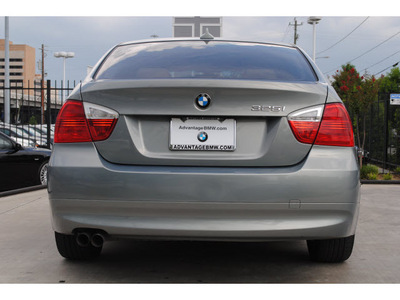 bmw 3 series 2006 lt  green sedan 325i gasoline 6 cylinders rear wheel drive automatic 77002