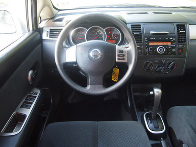 nissan versa 2011 silver sedan 1 8 s gasoline 4 cylinders front wheel drive automatic 76049