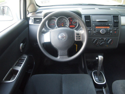 nissan versa 2011 white sedan 1 8 s gasoline 4 cylinders front wheel drive automatic 76049