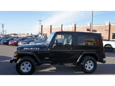 jeep wrangler 2005 black suv unlimited gasoline 6 cylinders 4 wheel drive 6 speed manual 79065