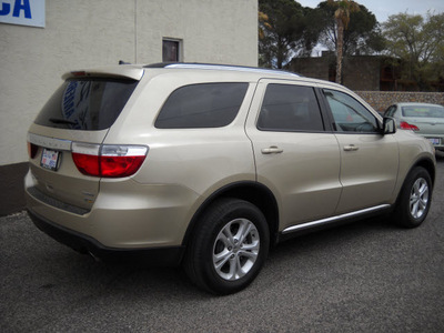 dodge durango 2011 gold suv gasoline 6 cylinders all whee drive automatic 79925