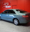 toyota camry 2010 green sedan le gasoline 4 cylinders front wheel drive automatic 76116
