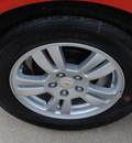 chevrolet sonic 2012 orange hatchback lt gasoline 4 cylinders front wheel drive 6 speed automatic 76206