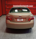 toyota camry 2009 tan sedan le gasoline 4 cylinders front wheel drive automatic 76116