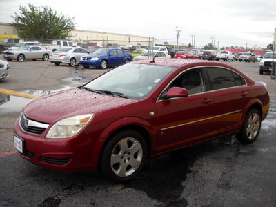 saturn aura 2007 red sedan xe gasoline 6 cylinders front wheel drive automatic 79925