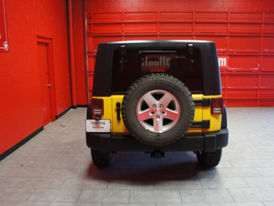 jeep wrangler 2008 yellow suv rubicon gasoline 6 cylinders 4 wheel drive 6 speed manual 76116