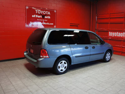 ford freestar 2005 blue van s gasoline 6 cylinders front wheel drive automatic 76116