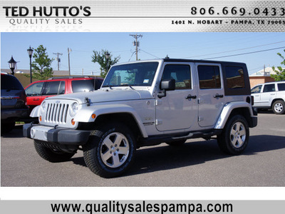 jeep wrangler unlimited 2010 silver suv sahara gasoline 6 cylinders 4 wheel drive 6 speed manual 79065