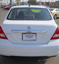 nissan versa 2011 white sedan gasoline 4 cylinders front wheel drive automatic 79925