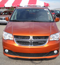 dodge grand caravan 2011 orange van flex fuel 6 cylinders front wheel drive automatic 79925