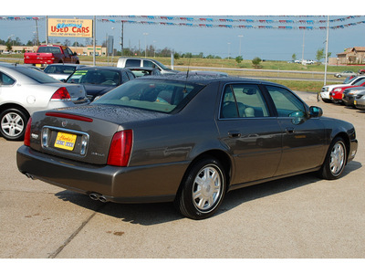 cadillac deville 2003 brown sedan gasoline 8 cylinders dohc front wheel drive automatic with overdrive 77340