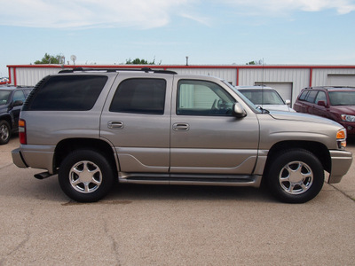 gmc yukon 2002 gray suv denali gasoline 8 cylinders all whee drive automatic with overdrive 77340
