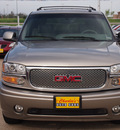 gmc yukon 2002 gray suv denali gasoline 8 cylinders all whee drive automatic with overdrive 77340