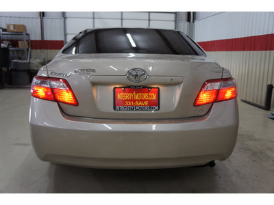 toyota camry 2009 tan sedan le gasoline 4 cylinders front wheel drive automatic 79110