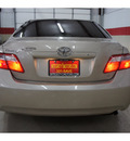 toyota camry 2009 tan sedan le gasoline 4 cylinders front wheel drive automatic 79110