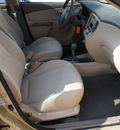 kia rio 2011 beige sedan lx gasoline 4 cylinders front wheel drive not specified 75080