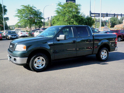 ford f 150 2006 green xlt 8 cylinders automatic 55124