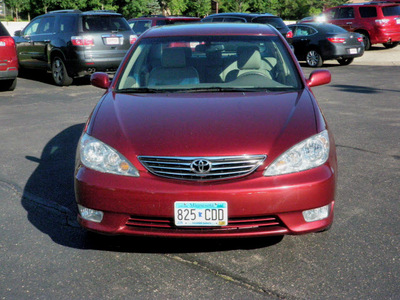 toyota camry 2005 red sedan xle v6 gasoline 6 cylinders front wheel drive automatic 55124