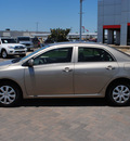 toyota corolla 2010 gold sedan le gasoline 4 cylinders front wheel drive automatic 76087