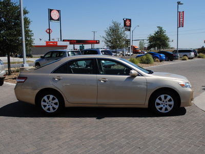 toyota camry 2011 gold sedan le gasoline 4 cylinders front wheel drive automatic 76087