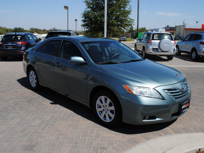 toyota camry 2007 green sedan xle gasoline 4 cylinders front wheel drive automatic 76087