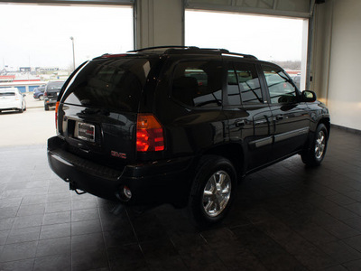 gmc envoy 2003 black suv slt gasoline 6 cylinders 4 wheel drive automatic 76087