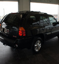 gmc envoy 2003 black suv slt gasoline 6 cylinders 4 wheel drive automatic 76087