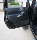 jeep wrangler unlimited 2011 black suv rubicon gasoline 6 cylinders 4 wheel drive 75080