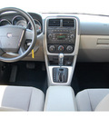 dodge caliber 2010 silver hatchback sxt gasoline 4 cylinders front wheel drive automatic 77070