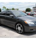 toyota camry 2009 dk  gray sedan le gasoline 4 cylinders front wheel drive automatic 77070