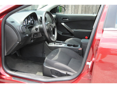 pontiac g6 2009 red sedan gt gasoline 6 cylinders front wheel drive autostick 77070
