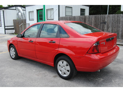 ford focus 2007 red sedan zx4 se gasoline 4 cylinders front wheel drive automatic with overdrive 77070